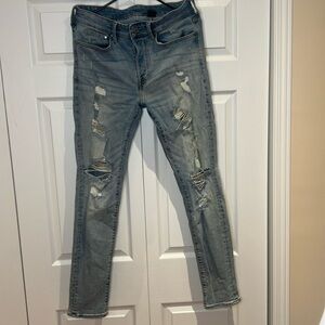 Skinny light denim blue ripped jeans